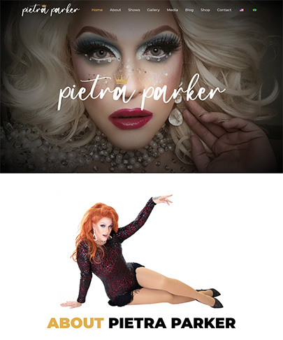 foto da home do site da Pietra Parker. Foto do banner é o rosto da drag queen com uma peruca loira, cílios bem grandes, batom vermelho e muitas perolas no pescoço. abaixo uma outra foto onde a Pietra veste peruca longa ruiva, esta sentada no chão com pernas esticadas uma mão apoiada no chão e outro braço para cima. veste body estampado preto e vermelho e salto alto preto.